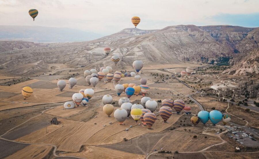 Hot air balloons in Goreme red valley - The One-Hour Flight Over Göreme Red Valley: What You’ll See